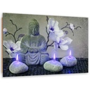 Cadre décoratif en hdf avec image de bouddha entouré de bougies et d'orchidées